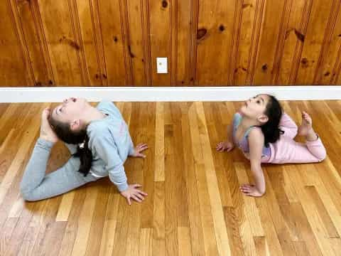 a man and woman lying on the floor