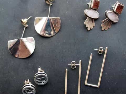 a group of earrings