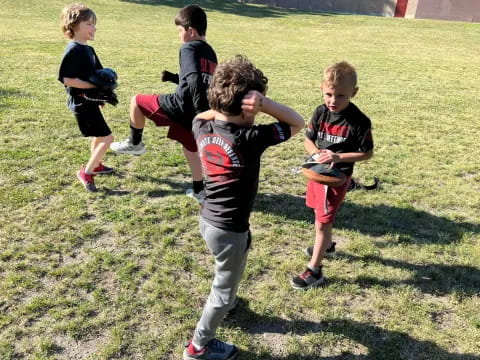 a group of kids playing with a toy