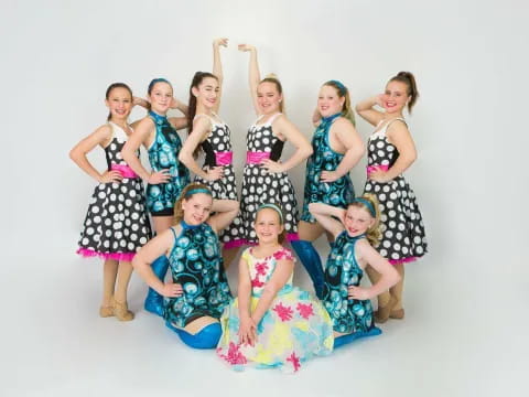 a group of women posing for a photo