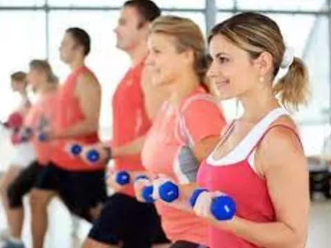 a group of people in a gym