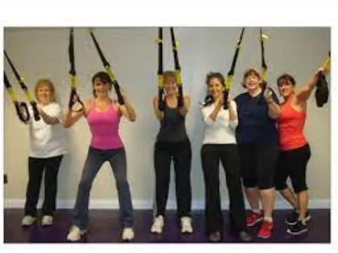 a group of women posing for a photo