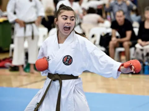 a person in a karate uniform