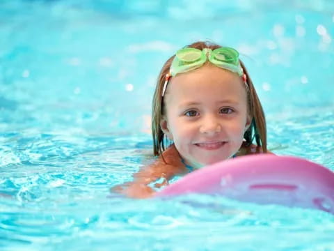 a girl in a pool