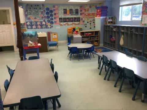 a classroom with desks and chairs