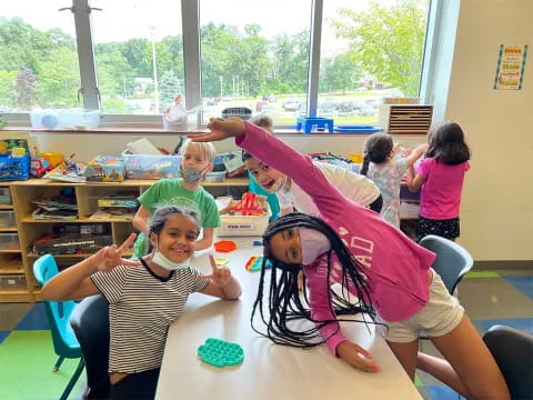 a group of children in a classroom