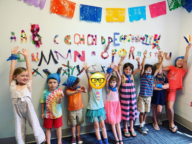 a group of children posing for a photo