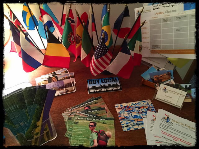 a table full of books and flags