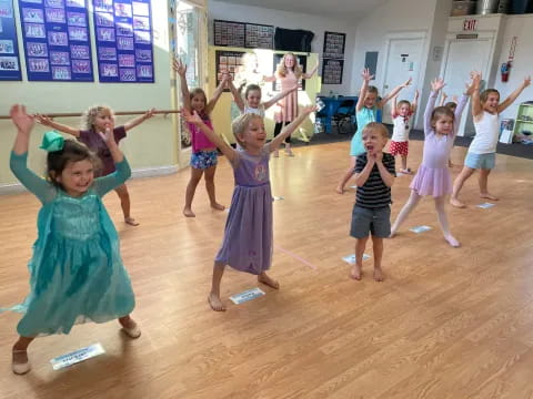 a group of children dancing