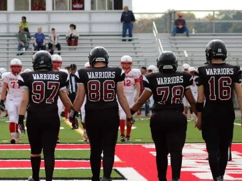 a group of football players on a field