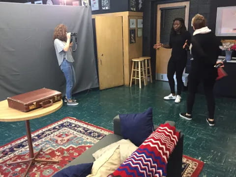 a group of women taking pictures