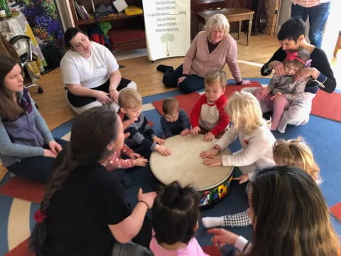 a group of children sitting on the floor