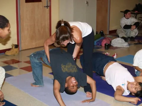 a group of people doing yoga