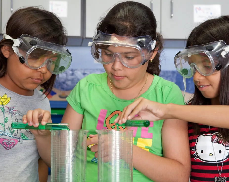 a group of girls wearing goggles