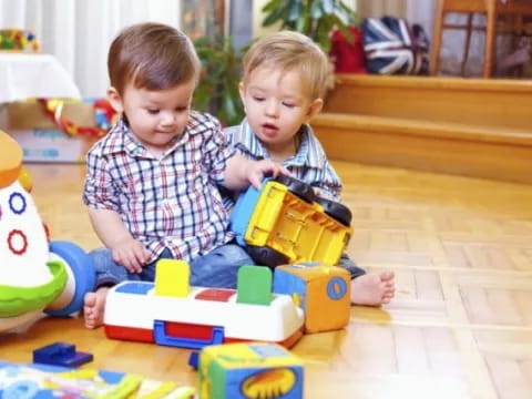 two children playing with toys