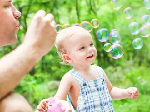 a person holding a baby