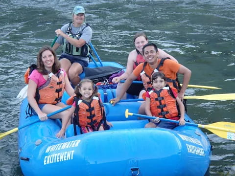 a group of people in a raft