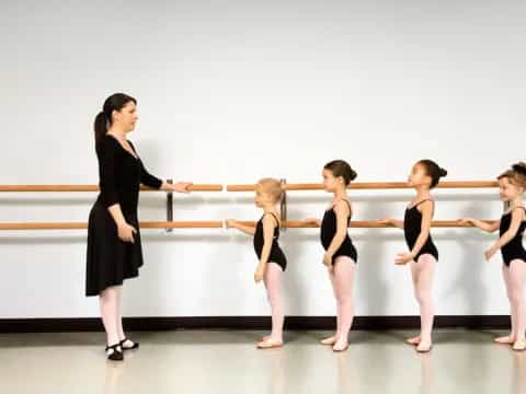 a group of women in black