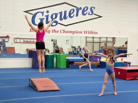 a group of girls in a gym