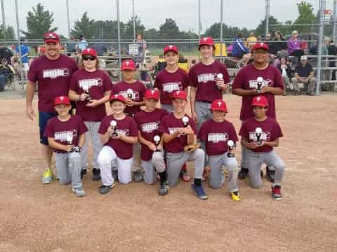 a group of baseball players posing for a photo