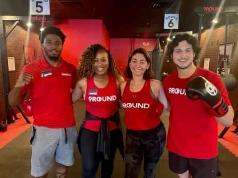 a group of people wearing boxing gloves