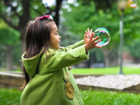 a girl holding a frisbee