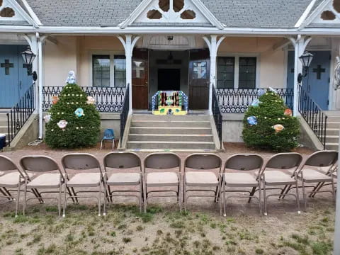 a group of chairs outside a house