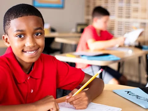 a young boy smiling