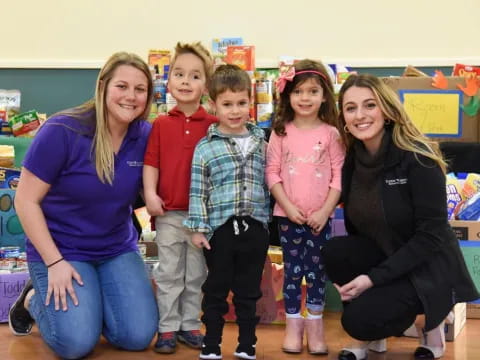 a group of children posing for a photo