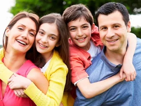 a group of people posing for a photo