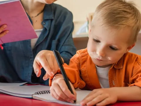 a child looking at a book