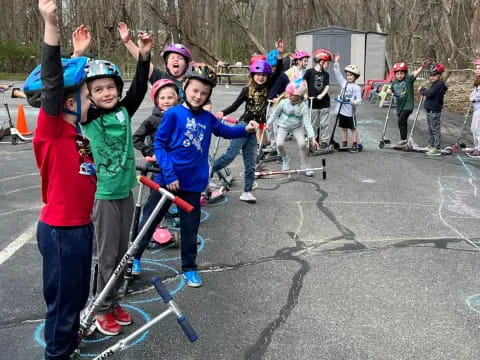 a group of kids on a bike