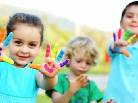 a group of kids holding toys