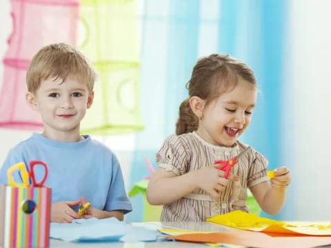 a couple of kids playing with toys