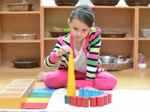 a child playing with blocks