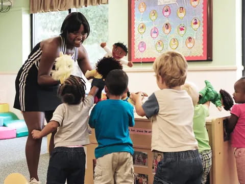 a woman teaching children