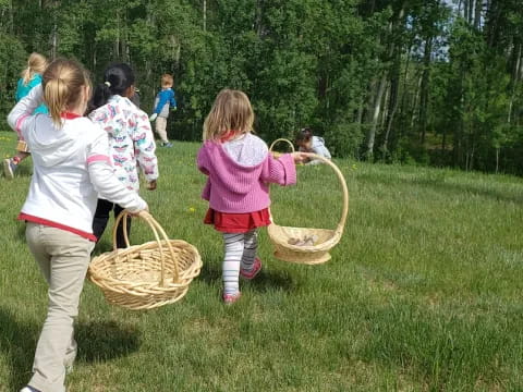 a group of children playing with baskets