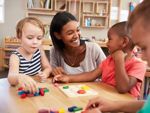 a person and several children playing with toys