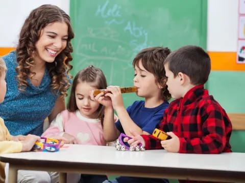 a teacher teaching her students