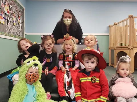 a group of children posing for a photo