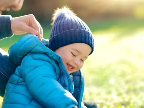 a child wearing a hat