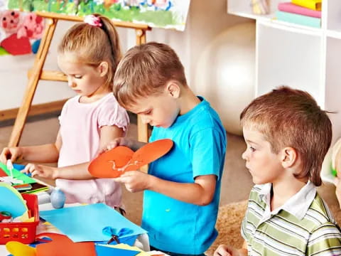 a group of children playing with toys