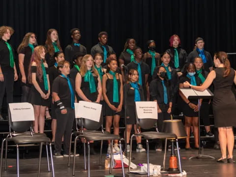 a group of people standing on a stage