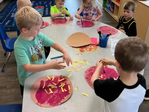 kids sitting at a table