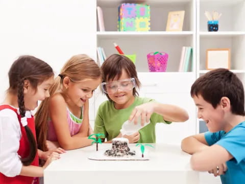 a group of children around a table