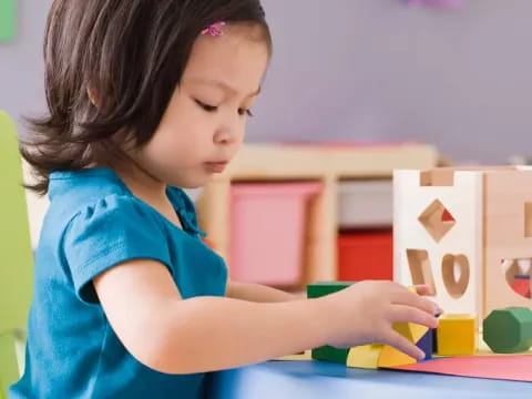 a child playing with a toy