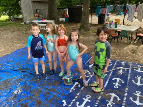 a group of children posing for a photo