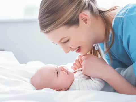 a person holding a baby