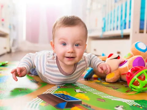 a baby playing with toys