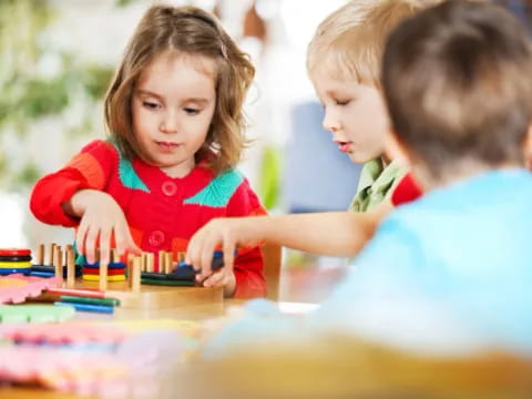 a group of children playing with toys